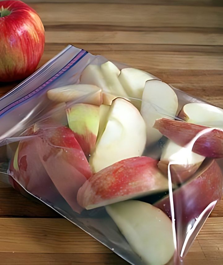 Those packages of pre-sliced apples you can buy at the store are great for a healthy snack on the go, but the price can add up. Make your own by:
1. Slice the apples.
2. Soak the apple slices in cold water for 3-5 minutes.
3. Soak the apple slices in lemon-lime carbonated soda such as 7-Up or Sprite for 3-5 minutes.
4. Divide the apple slices into snack-size portions.
5. Store the portions in Ziploc bags in the fridge.

This method keeps the apples from browning and makes them last longer.