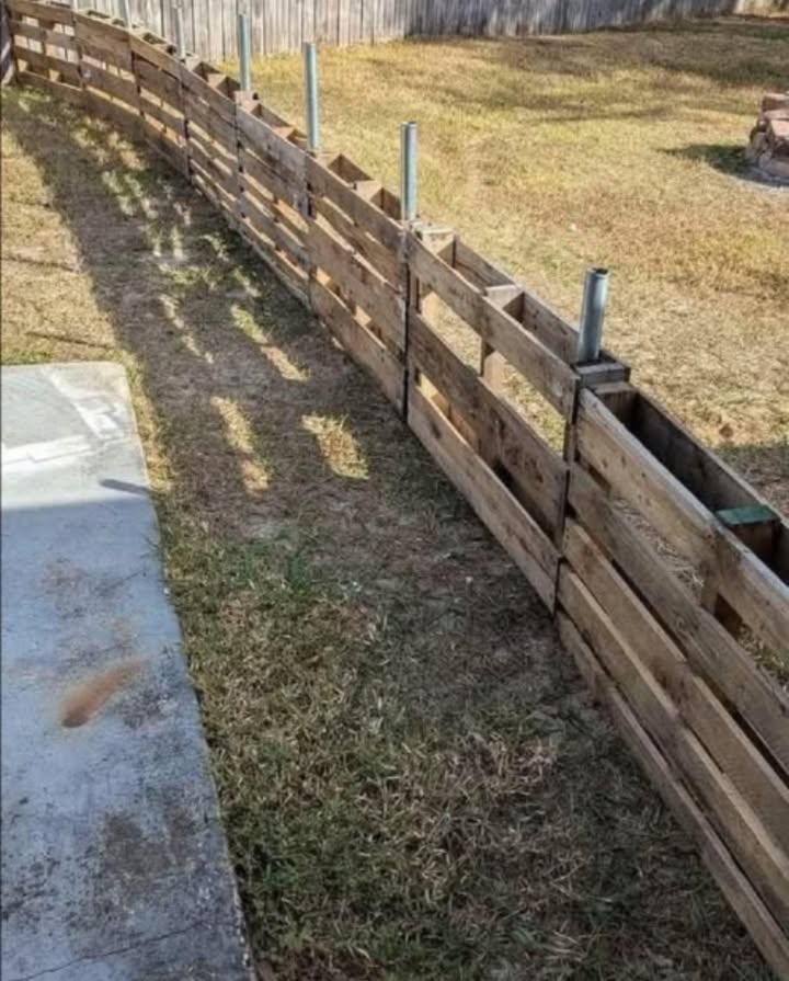 Idée de clôture en palettes DIY